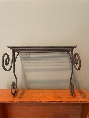 Wrought iron wall shelf